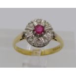 18ct ruby and diamond cluster ring, size N, 3.3g