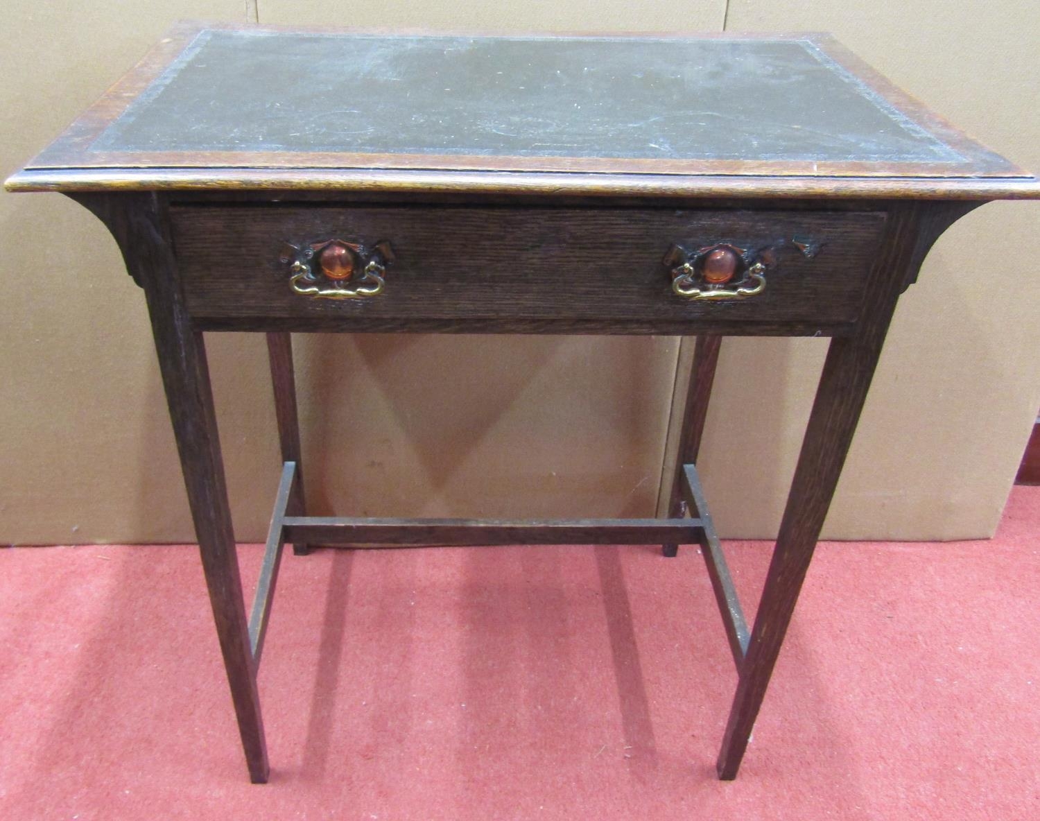 An Edwardian mahogany ladies writing desk, fitted with two frieze drawers on turned supports with