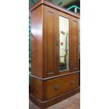 A Victorian mahogany wardrobe with central mirror panelled door over a deep frieze drawer, 120cm