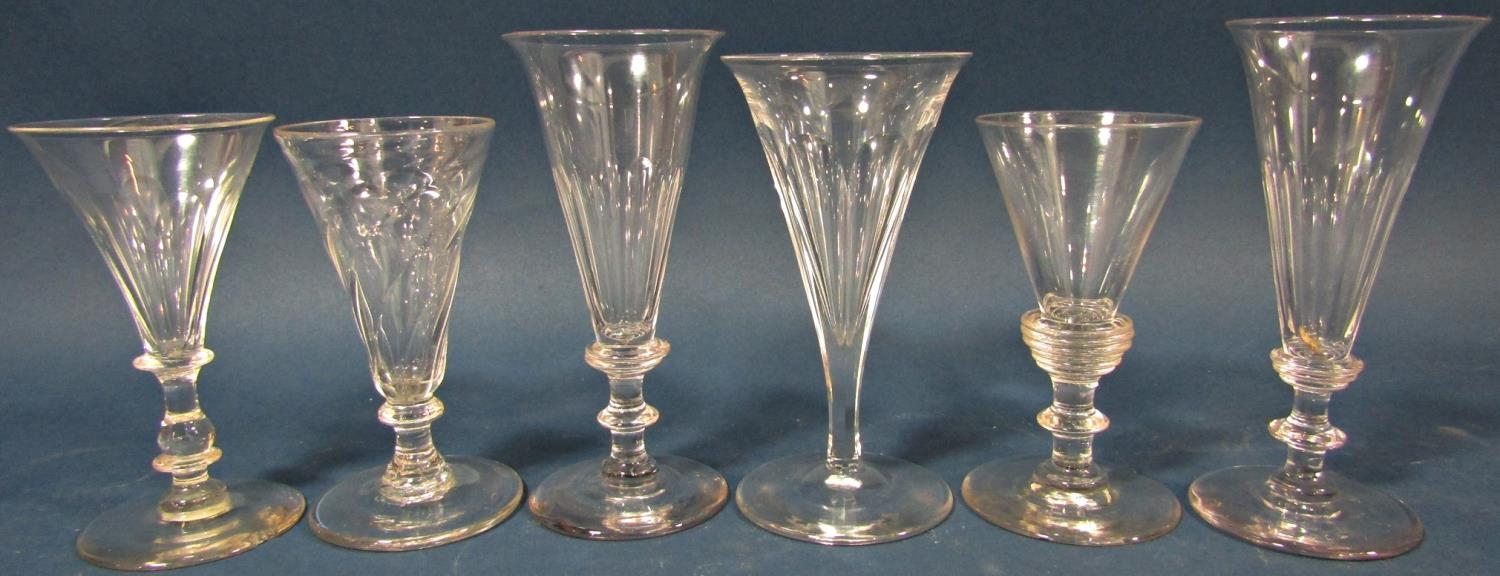 Six Georgian flute shaped wine glasses of varying design. 6