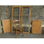 Two pairs of reclaimed stripped pine framed cupboard doors, 158 x 56cm (larger panels), 77 x 56cm