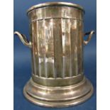 A silver wine cooler with fluted sides and two handles, Sheffield 1930, maker Finnigan, 16.5cm