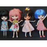 Four dolls in the style of Blythe 'Neo' dolls, customised by 'Blythe Obsession', with colour