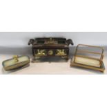 A 19th century letter rack with three gilded divisions set on a marble base with a two tone blue