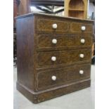 A Victorian pine bedroom chest of three long and two short graduated drawers with all over