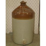 A vintage stoneware jar impressed number 344 and merchants mark for Alfred Ledbetter Wine Spirit