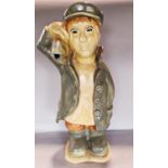“Catch of the Day” a glazed ceramic fisherman carrying a fish over his shoulder, 60cm high.
