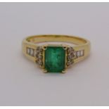 18ct vari-cut emerald and diamond ring, size S, 4.9g, with accompanying 2004 Kirk Freeport insurance