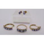 Group of 9ct jewellery comprising a sapphire and diamond ring, size J/K and two pairs of tanzanite