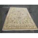 A large Ziegler design carpet with large floral palmettes on a beige ground, 370cm x 270cm approx