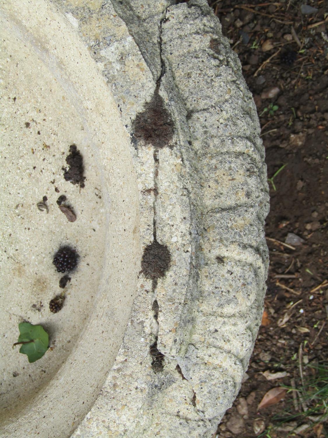 A pair of weathered cast composition stone garden urns, squat circular bowls with flared egg and - Image 2 of 3