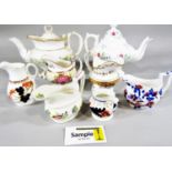 A collection of 19th century ceramic teapots, sauce boats, cream and milk jugs from various