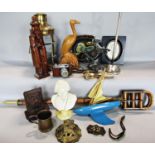 A miscellaneous collection of items including, a bamboo shooting stick, a bust of Beethoven, a brass