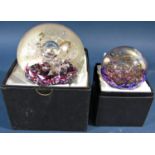 Two Selkirk of Scotland glass paperweights, both with gold bubble decoration, both with their