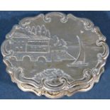 A Victorian silver vinaigrette with a silver gilt foliate interior, with a boating scene engraved to