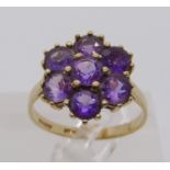 9ct amethyst daisy cluster ring, ring head 1.3cm W approx, size Q, 2.7g