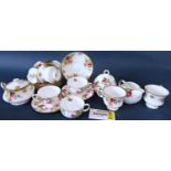 A Royal Stafford Rose pattern tea service for eight, together with a further oriental tea service
