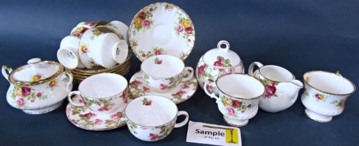 A Royal Stafford Rose pattern tea service for eight, together with a further oriental tea service
