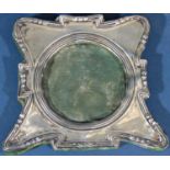 An Edwardian silver photo frame with a circular opening, Birmingham 1906, maker Henry Williamson,