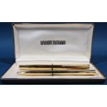 Waterman Facetted gold plated fountain pen with 18k nib and matching ball point pen in a Waterman