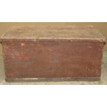 A 19th century stained pine blanket box with hinged lid and side drop carrying handles, (af)