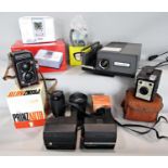 Photographic equipment consisting of a Prinz Auto semi automatic 2 1/4 square precision twin-lens
