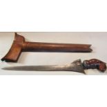 An Indonesian kris with a straight blade, with a wooden hilt and scabbard. 46cm long