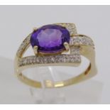 Stylised 9ct amethyst and diamond dress ring, size S, 3.9g