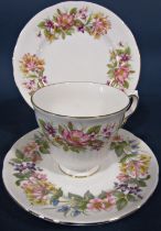A collection of Colclough Wayside pattern tea wares comprising teapot, sugar bowl, milk jug, five