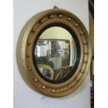 A convex wall mirror with later painted frame, 53cm overall, together with a retro teak dressing
