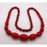 Graduated cherry amber coloured bead necklace, 47g