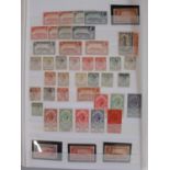 A duplicated mostly Mint Gibraltar stamp collection in a stock album and loose.