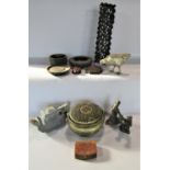 A Chinese carved panel to simulate clouds 31cm x 8cm, two Chinese bronze figurines, a pewter teapot,