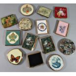 A collection of fifteen vintage compacts, the majority by Stratton, with floral themes, various