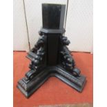 Victorian oak octagonal column pedestal, supported by four carved winged creatures, 66cm high