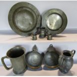 19th century Pewter ware comprising plates, a two of bowls with flat handles, tankards and a teapot.