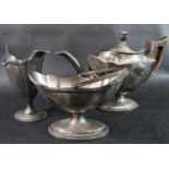 A three piece sterling silver tea service stamped Sterling to base (af) 20oz approx