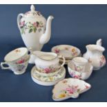 A collection of decorative floral table wares including Crown Derby Posies examples and a Wedgwood