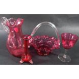 A small red Venetian glass posy vase on clear scrolled feet, 13cm, a pink bell shaped wine glass,