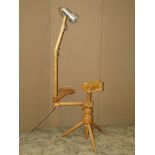 An ash adjustable lace makers stand and combined lamp