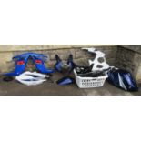 A Suzuki GSXR 1000 petrol tank together with a quantity of Suzuki plastic body kits/panels/parts