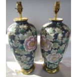 A pair vase shaped table lamps with chrysanthemum decoration 50cm high, a maiolica type