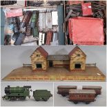 A large collection of Hornby 0 gauge railway locomotives, coaches, rolling stock, track, boxed level
