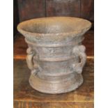 Antique cast iron mortar with four scrolled loop handles 25cm in d x 22cm h