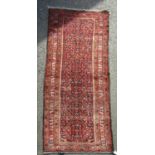 A North West Persian Malayer Runner with intricate central design and evenly spaced borders