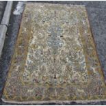 A Persian Tree of Life Design Rug in ochre, umber and blue tones, 140 x 210 cm