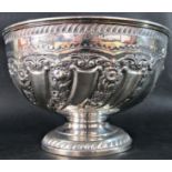 A Victorian silver fruit bowl with floral embossed and engraved decoration, 22cm diameter, with