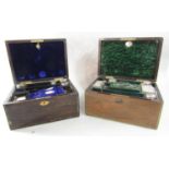 A 19th century coromandel wood travel box with velvet lined interior containing cut glass bottles