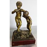 A bronze statuette of two playful cherubs raised on a marble plinth , signed Kley (Louis) 18.5 cm