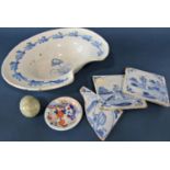 A blue and white hand painted barbers dish, two delft tiles, etc